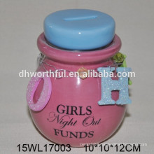 Ceramic pink coin bank with lid